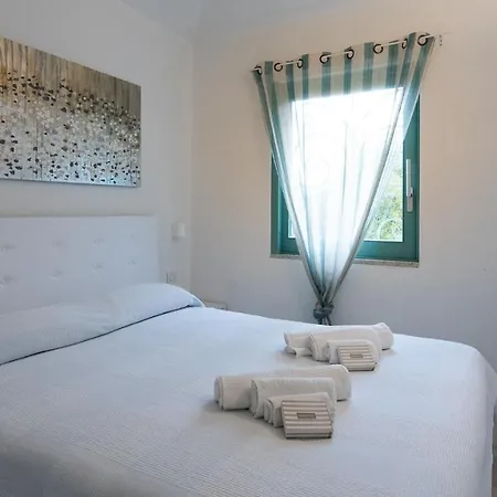 Welcomely - Puntaldia Villa Nuzza Apartment Puntaldia